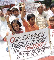 Supporters of the All India Shia-Sunni United Front protesting against the BJP ‘Gaurav Yatra’ in Gujarat at the Jantar Mantar in the Capital on Monday.