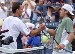 Tommy Haas of Germany shakes hands with David Sanchez