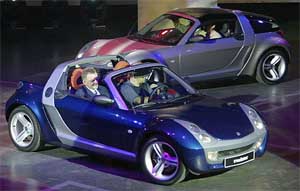 Andreas Renschler, president of the MCC Smart car manufacturer, drives a roadster-coupe