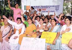 Activists of the BJP Mahila Morcha staging a dharna
