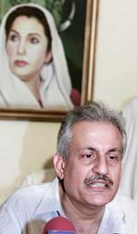 Mr Raza Rabbani, General Secretary of former Prime Minister Benazir Bhutto's Pakistani People Party, speaks to reporters in Karachi on Friday
