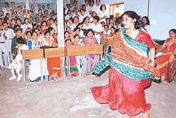 A dance performance in progress at DAV Model School