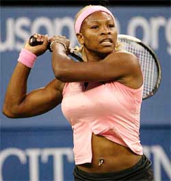 Serena Williams of the United States displays a belly button