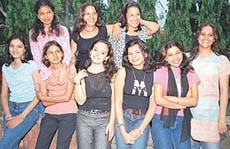 Models pose for a photograph 