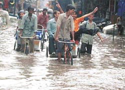 A water-logged bazaar of Paharganj near New Delhi Railway Station
