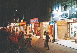 A view of the Sector 22-D  market at night.