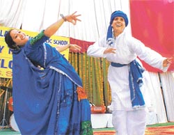 Teachers of Greenland Senior Secondary School present a dance item to regale their students