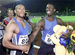 Britains Dwain Chambers (right) is congratulated by US runner Maurice Green after the mens 100m