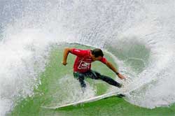 Current Association of Surfing Professionals world number seven Cory Lopez from the United States wins his heat 