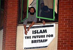 Muslims put up a poster on the Finsbury Park Mosque