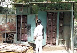 This is no MTNL linesman, but a curious schoolboy, fascinated by the open junction boxes, having a close look at the ‘intricacies of communication’