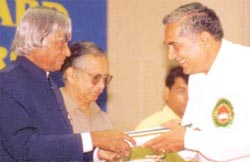 Mr B. S. Malik receiving the award from the President