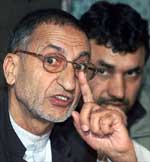HC chairman Abdul Gani Bhat speaks during a news conference
