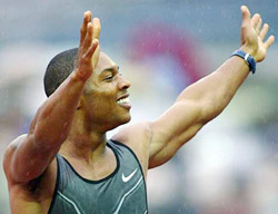 Bernard Williams of the USA celebrates after winning the men's 100 metre final