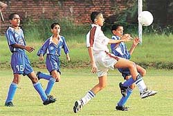 A keen tussle to gain control of the ball in the final of the Chandigarh Junior Challenge Football Tournament played between the Chandigarh Football Academy and St Stephens School