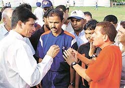 Mr M. Ramsekhar, Deputy Commissioner-cum-Director, Sports, Chandigarh Administration, tries to reason with the coach and officials of St Stephens School