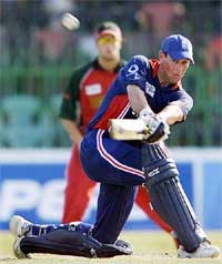 Englands Marcus Trescothick sweeps a delivery on way to making a century