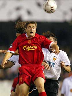 Liverpools Michael Owen tries to head the ball during their Champions League Group B match against Valencia 