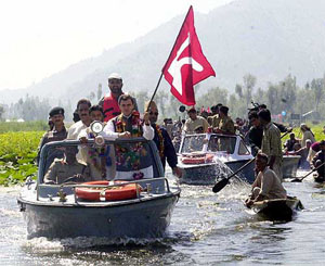 NC chief Omar Abdullah waves the party flag