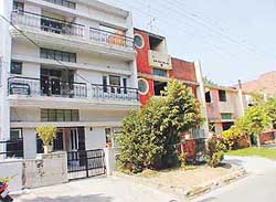 A row of houses stands on the land opposite house No. 229 in Sector 60, SAS Nagar