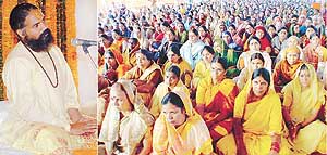 Swami Gopal Mani deliveres a sermon as devotees listen at the Sector 28-A ground in Chandigarh