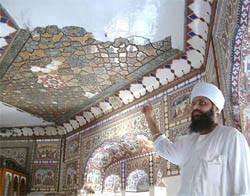 A damaged portion of frescoes at Gurdwara Baba Atal in Amritsar