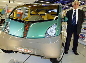 Guy Negre, head of French company MDI enterprises S.A., presents at the Paris Auto Show on Friday.