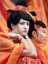 A German entertainer dressed in a traditional Chinese costume