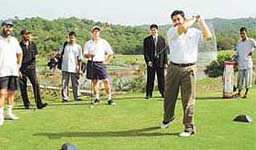 Golfers of the city in action at Forest Hill Golf Course near Karoran village