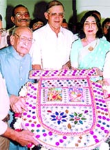Pankha of Phool Walon ki Sair being presented to Lt-Governor Vijai Kapoor 