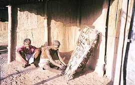 A model of a tribal working at the museum