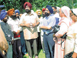 The Punjab Animal Husbandry, Dairy and Fisheries Minister, Mr Jagmohan Singh Kang, interacts with trainees at a dairy training centre of the Animal Husbandry Department