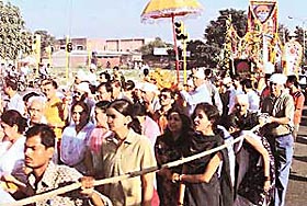 Devotees participate in Palki Shobha Yatra organised by the Shirdi Sai Samaj, Sector 29