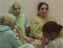 Relatives of the victim in the robbery-cum-murder incident at BRS Nagar