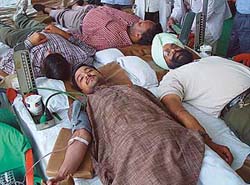 Volunteers donate blood at a camp organised by the Bharatiya Janata Yuva Morchas Chandigarh unit at Kamalam