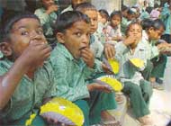 Students of Government Primary School, Lalton Kalan, enjoy mid-day meal