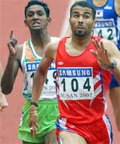 Bahrain's Rashid Mohamed pulls ahead of India's K. M. Binu