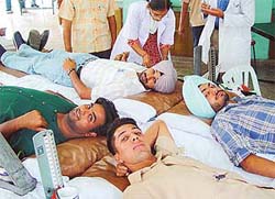 Students donate blood in a camp at Students' Centre, Panjab University