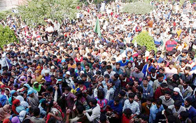 Thousands of people throng the residence of People's Democratic Party leader Mufti Mohammad Sayeed and her daughter Mehbooba Mufti