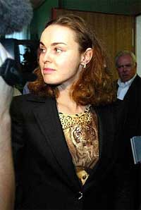 Former world number one Martina Hingis arrives at a news conference
