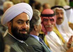 Members of Iraqi Parliament attend a meeting