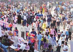 A huge crowd at a fete organised at Kundan Vidya Mandir