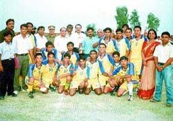Ganga International School team, which won the CBSE Football Tournament, with the trophy