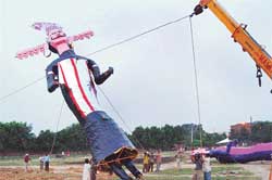 An effigy of Ravana being erected on the eve of Dasehra at the Sector 46 ground