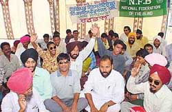 Members of the National Federation of the Blind, Punjab, protest in front of the office of the Director, Social and Women and Child Development, Punjab, in Sector 34
