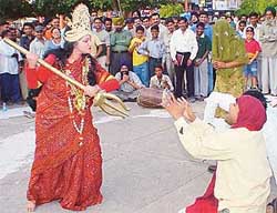 Goddess Durga is shown punishing the advocates of female foeticide in a play staged by the Mask Theatre Group 