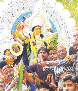 Devotees of Durga on their way to the Yamuna for immersion on the occasion of Vijaya Dashami
