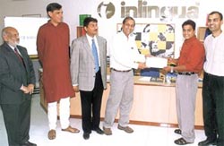 Inlinguas first student to complete a language training course being awarded the certificate by Mr Siddharth Basu