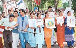 Students of Government College of Education, Sector 20, participate in a raly on AIDS awareness