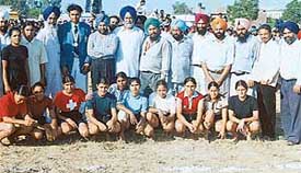 Mr Manprit Singh, who won gold medal in Busan , and Dr Daler Singh Multani, SMO, Lalru, along with participants, during a tournament organised by Baba Prithavi Singh Azad Memorial Sports Club, Lalru,